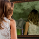 Illustration for article titled Melania Wishes Just Once She Could Look In Mirror Without Own Reflection Turning Away, Gust Of Wind Blowing Through Room, Doors Slamming Shutem/em